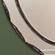 1970s Italian oval mirror by Crystal Arte with faceted glass frame