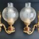 Pair of bronze wall sconces in Empire/Napoleon III style.