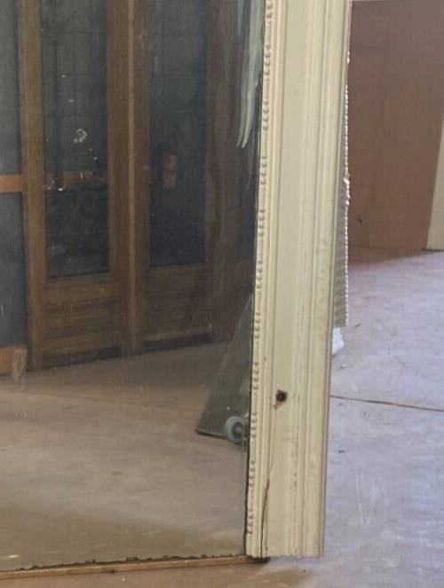 Louis XVI style mirror in wood and patinated stucco 20th century