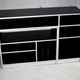 Storage cabinet wood compressed lacquered black lining margins aluminum. France, circa 1975.