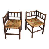 Pair of corner armchairs paillés in turned wood antique multicolored seat