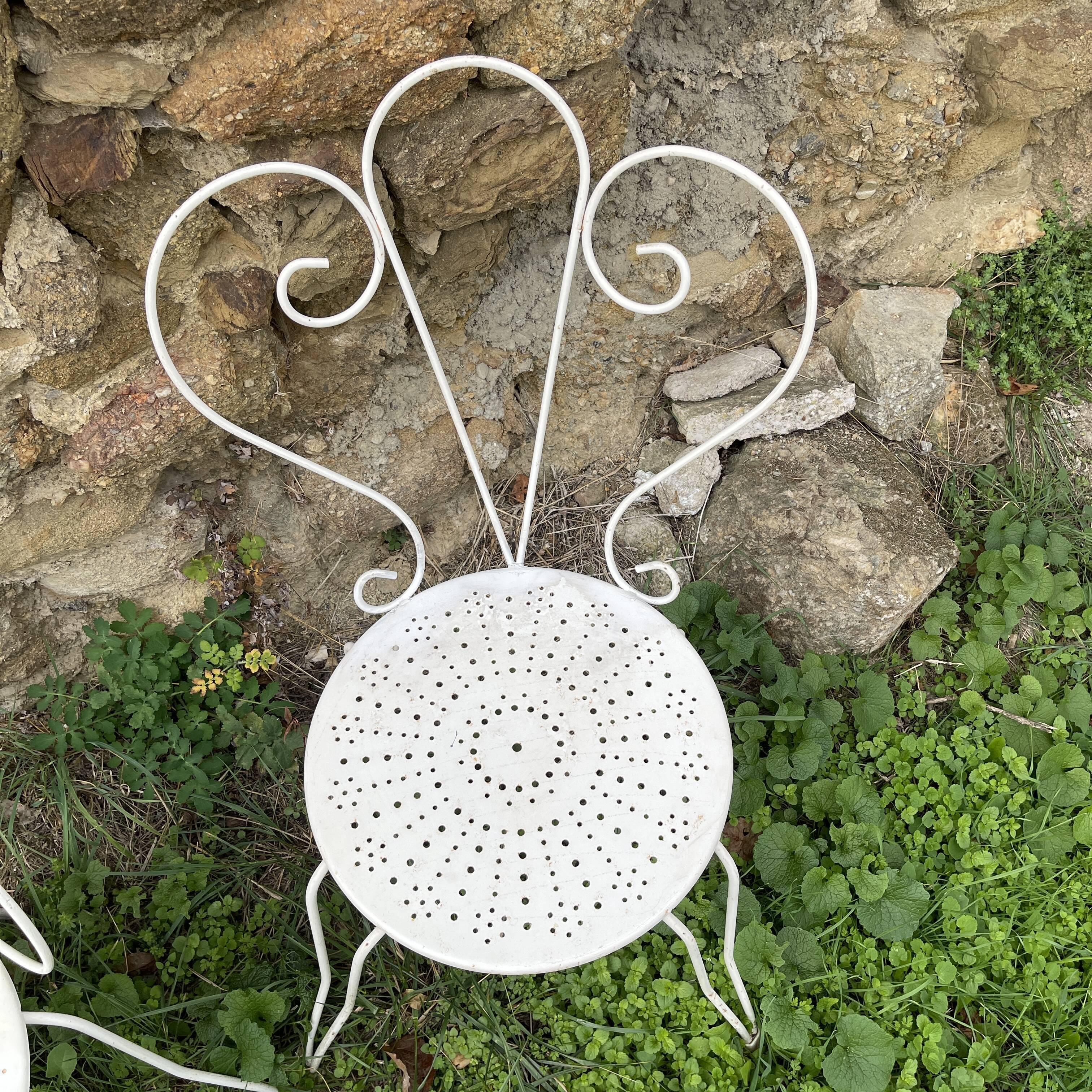 Armchair and garden chair in wrought iron