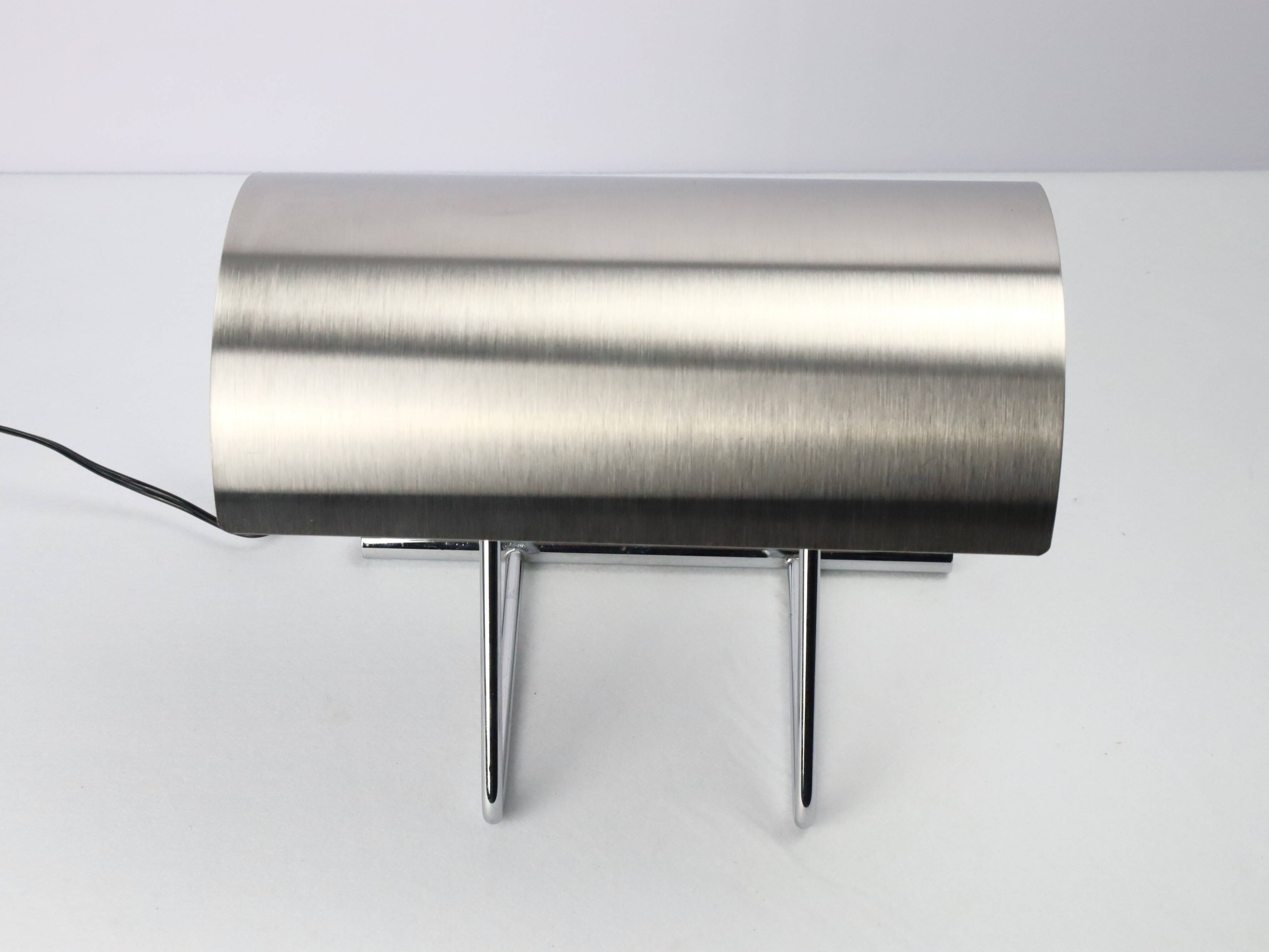 Stainless steel lamp from the 1970s in the style of François Monnet.