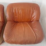 Four vintage armchairs, leather and fabric, 70s