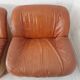 Four vintage armchairs, leather and fabric, 70s