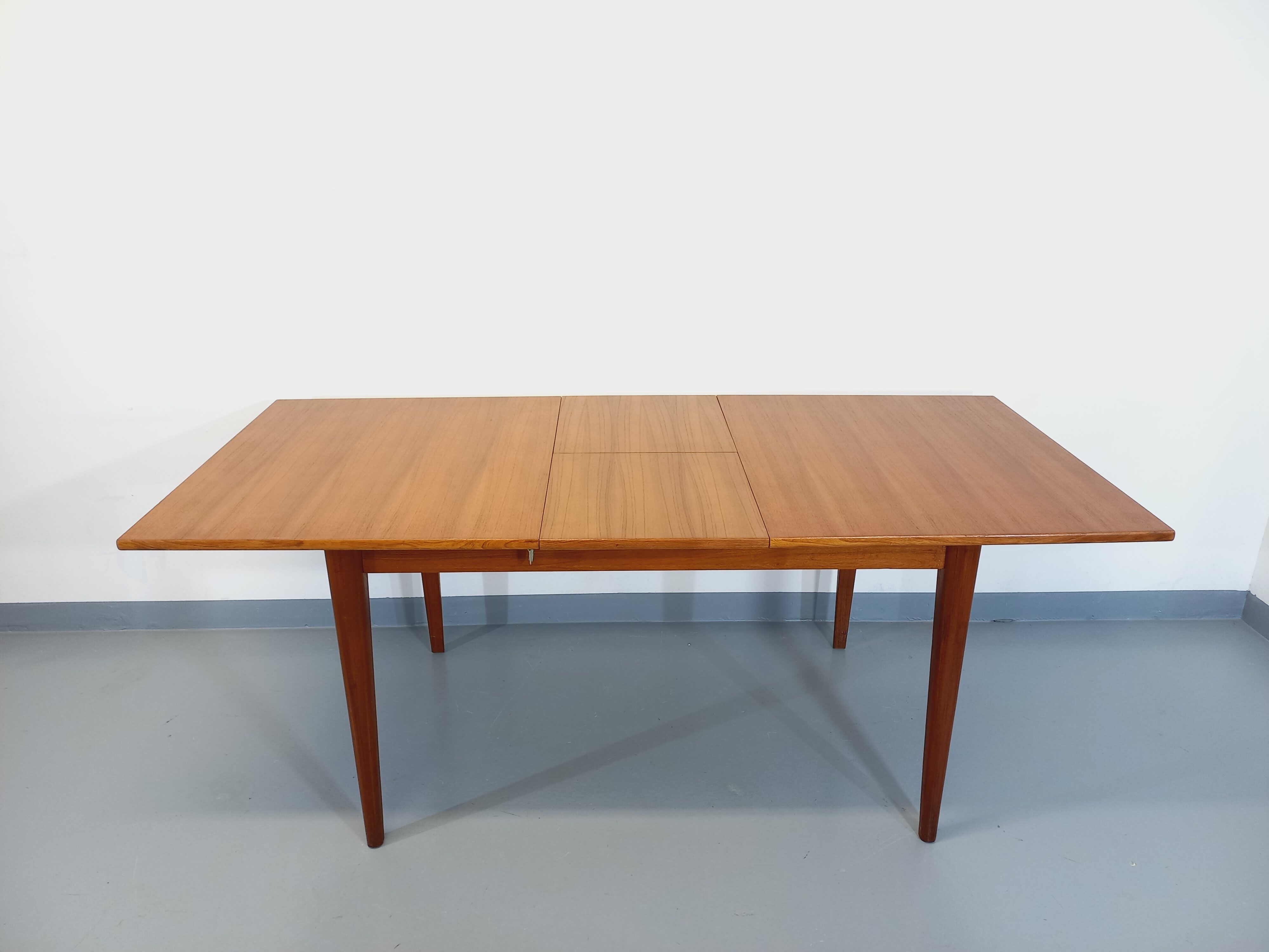 Vintage Scandinavian dining table from 50s 60s teak with extension