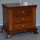 Set of hardwood dressers with finely carved bases.