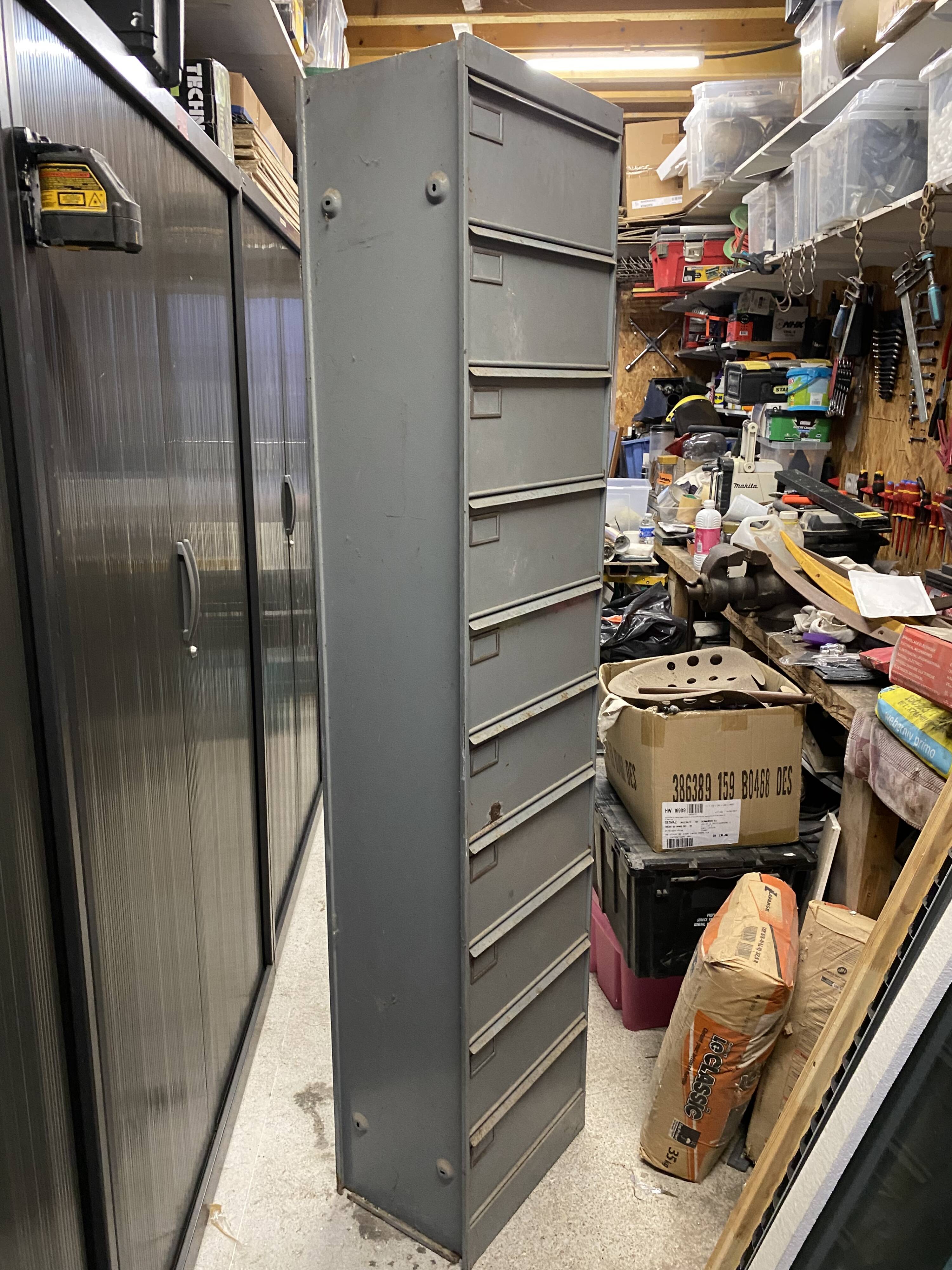 Industrial metal workshop desk storage unit with 10 flaps, 1950s.