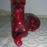Saint Clement. Dog lying in earthenware
