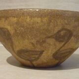 Chamotte clay bowl with bird decoration