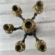 Candelabra with cherub in patinated bronze