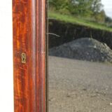 Large antique mirror in a flame mahogany frame; 132x82 cm