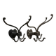 Brutalist pair of wall-mounted coat hooks.