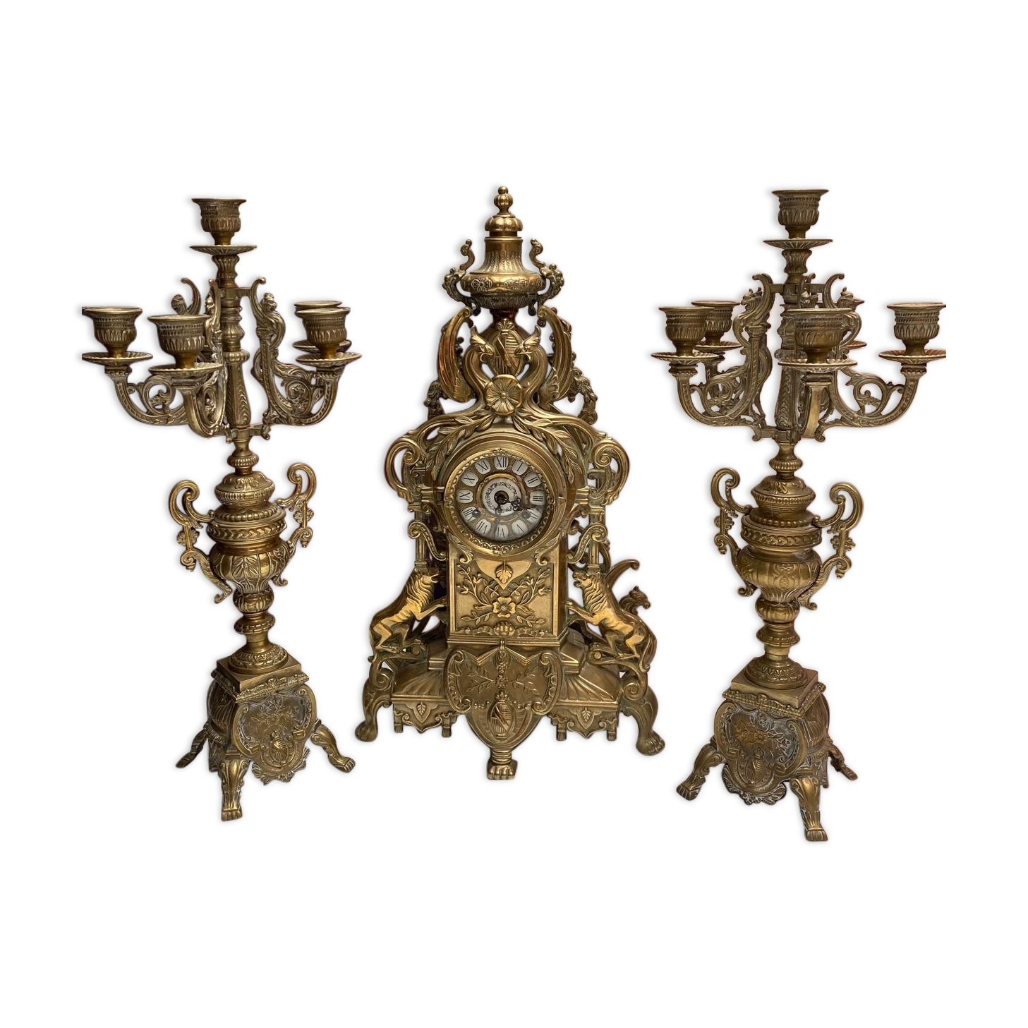 Fireplace trim clock and adornment of antique bronze candelabra