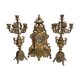 Fireplace trim clock and adornment of antique bronze candelabra