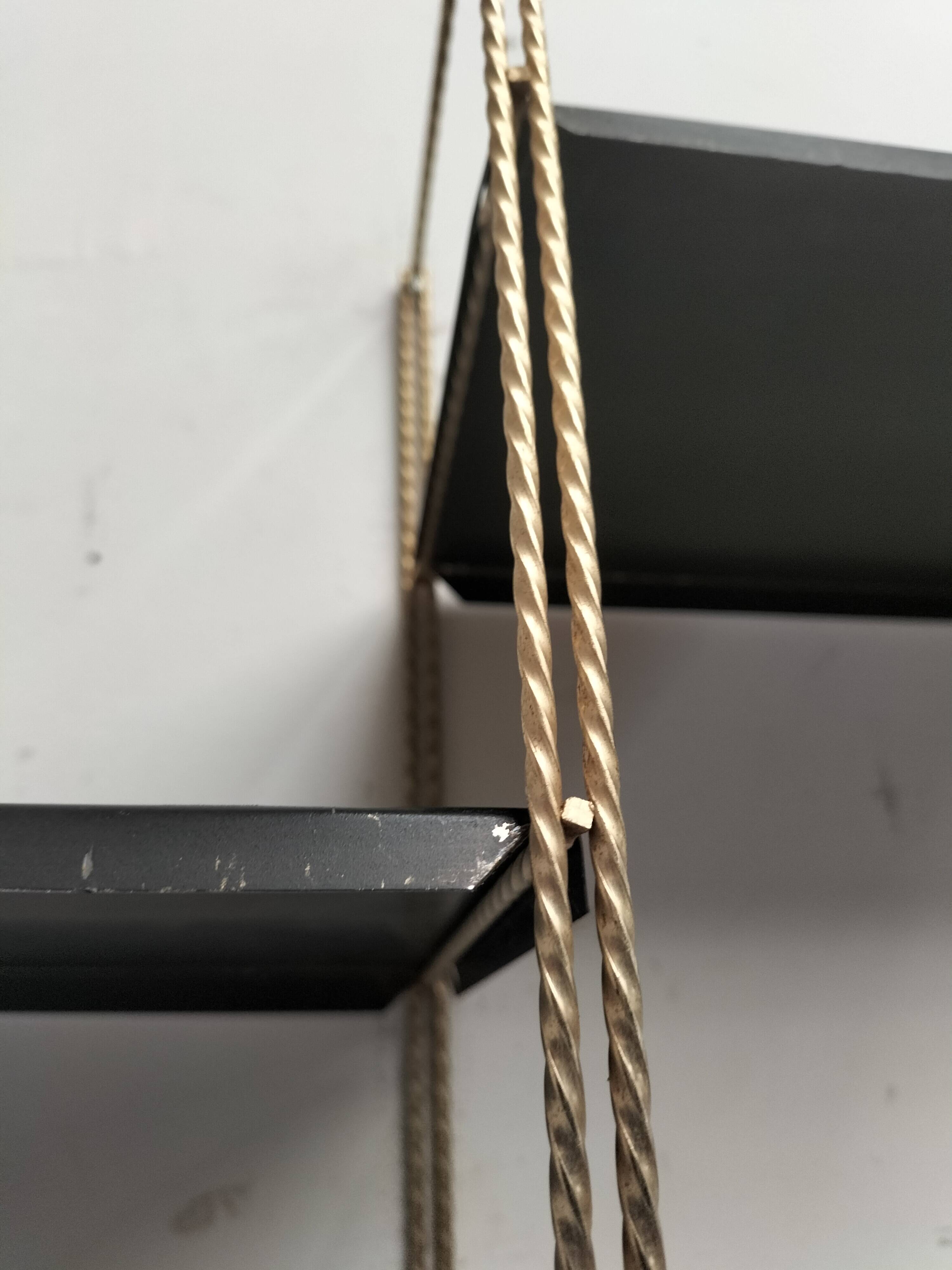 Modular black metal shelf