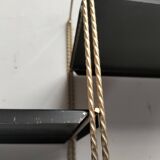 Modular black metal shelf