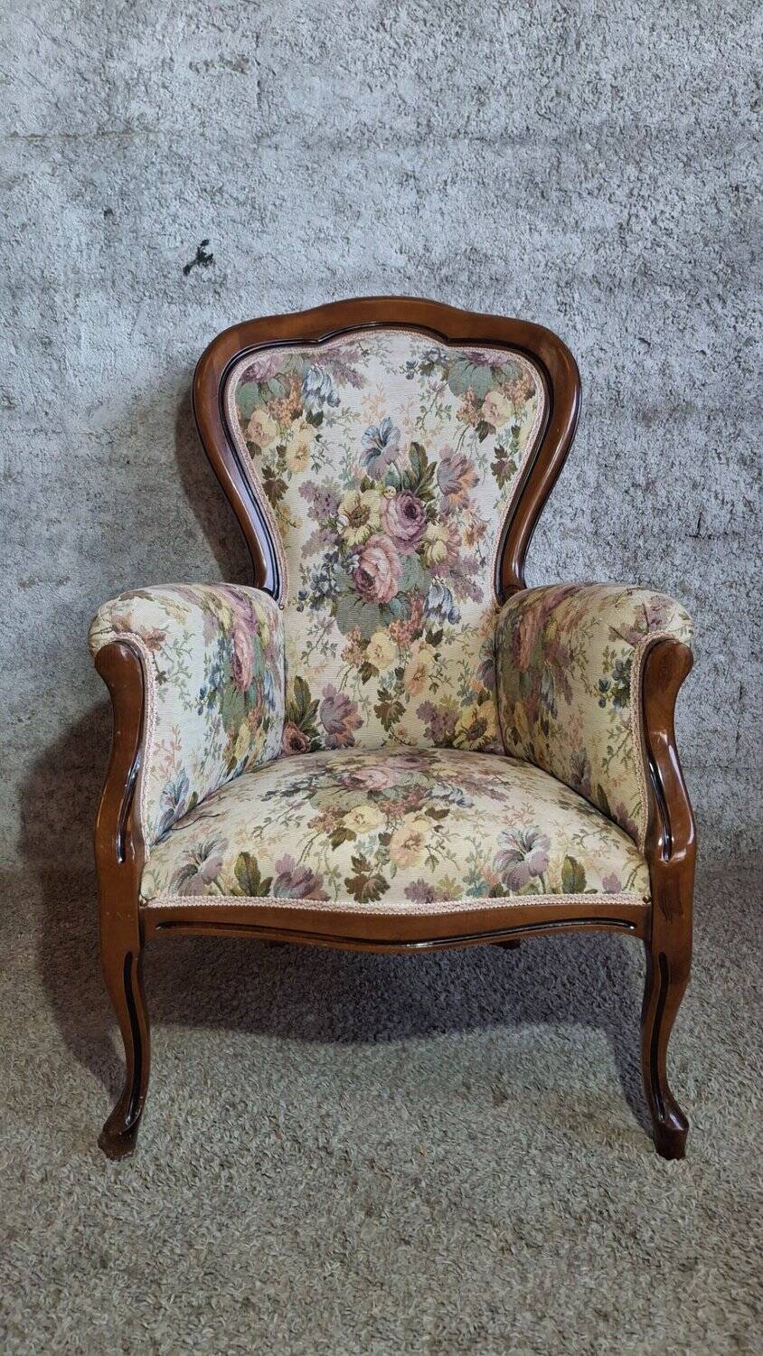Louis XV style armchair with floral jacquard upholstery.