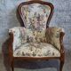 Louis XV style armchair with floral jacquard upholstery.