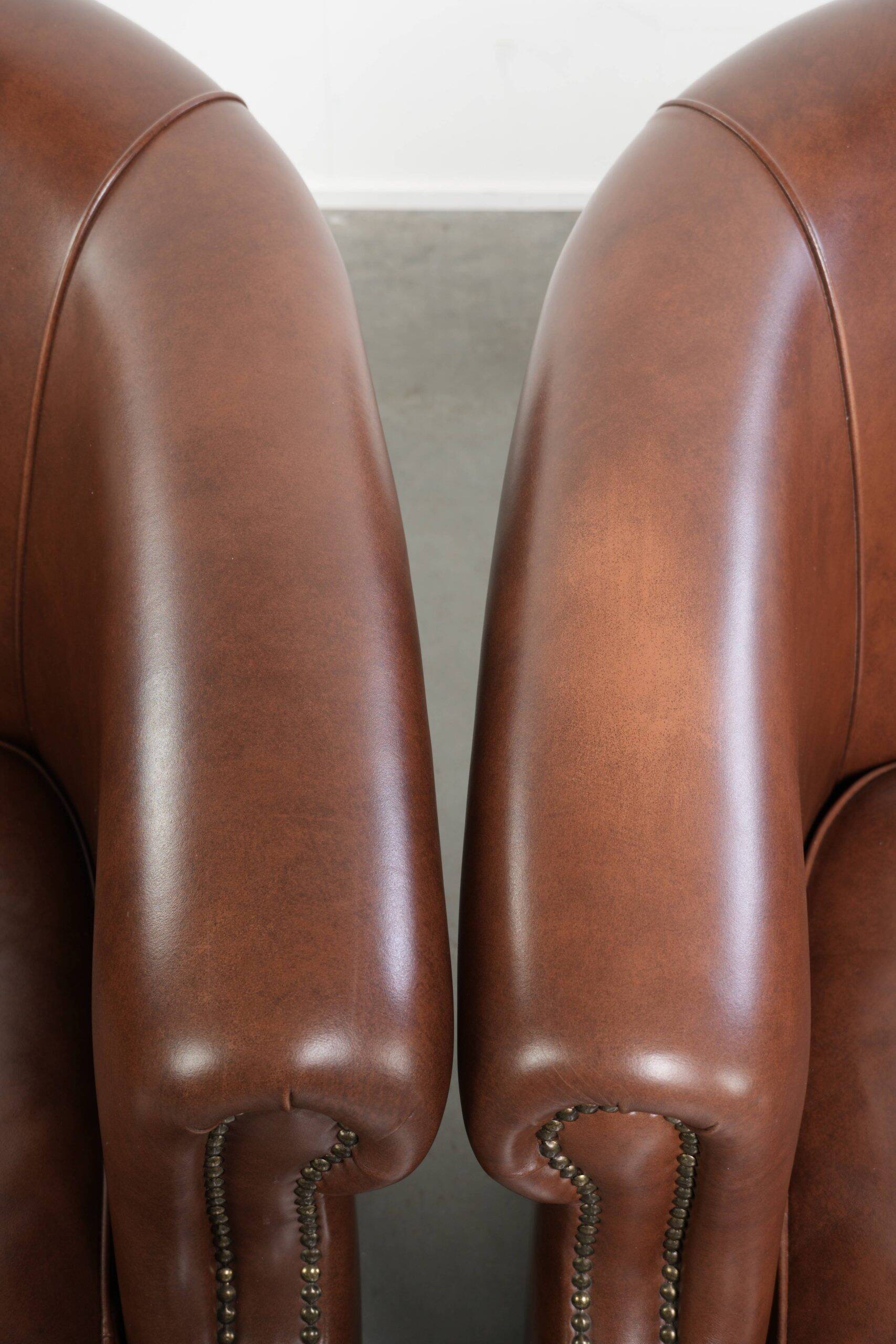 Set of 2 cognac-coloured cow leather club armchairs in English style