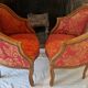 Pair of louis xv cabriolet armchairs with sculpted wood and pink & red floral fabric