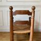 Straw and turned wood fireplace armchair in the style of Charles Dudouyt