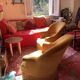 Paire de fauteuils crapaud jaune beige velours frange