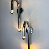 Pair of Space-Age tubular wall lights, chromed metal, Italy, 1970s