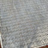 High wicker and rattan table