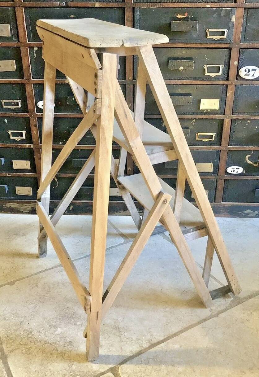 Old small painter's stepladder, wooden trade furniture, step stool
