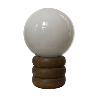 Vintage globe opaline lamp on raw wooden base