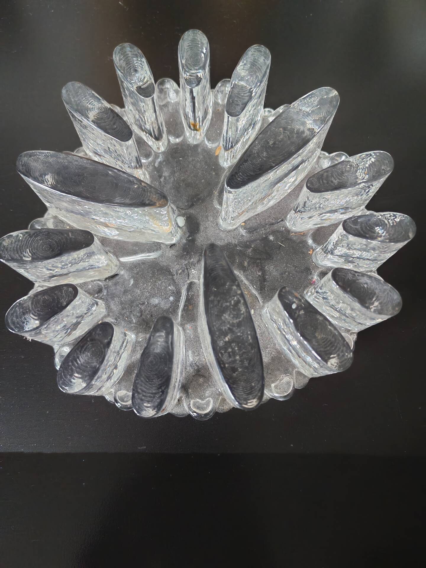 Large glass candle holder in iceberg brutalist style.