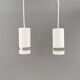 Two small cylindrical hanging lamps in white powder-coated 1980s