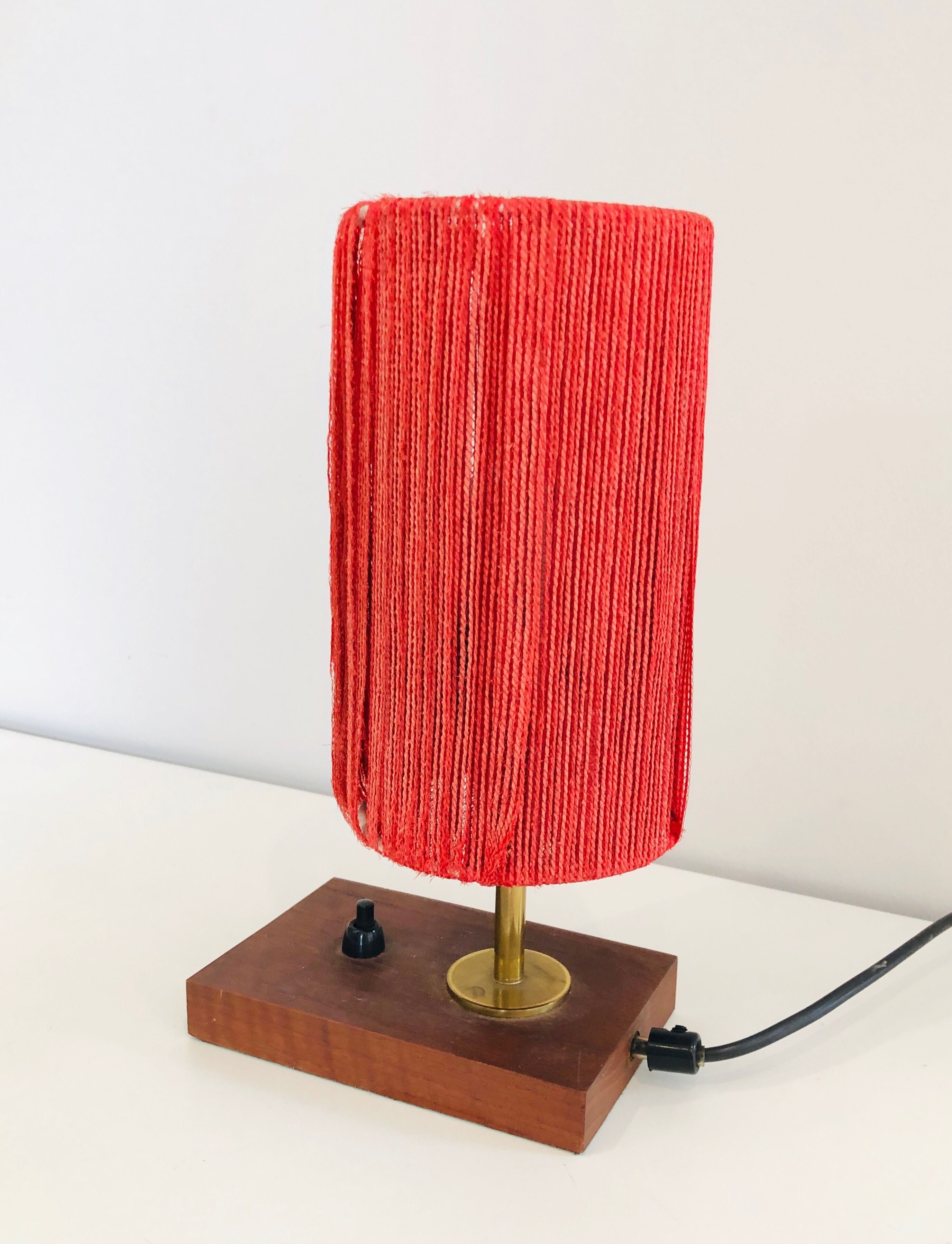 Lamp in wood, brass and wool