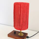Lamp in wood, brass and wool