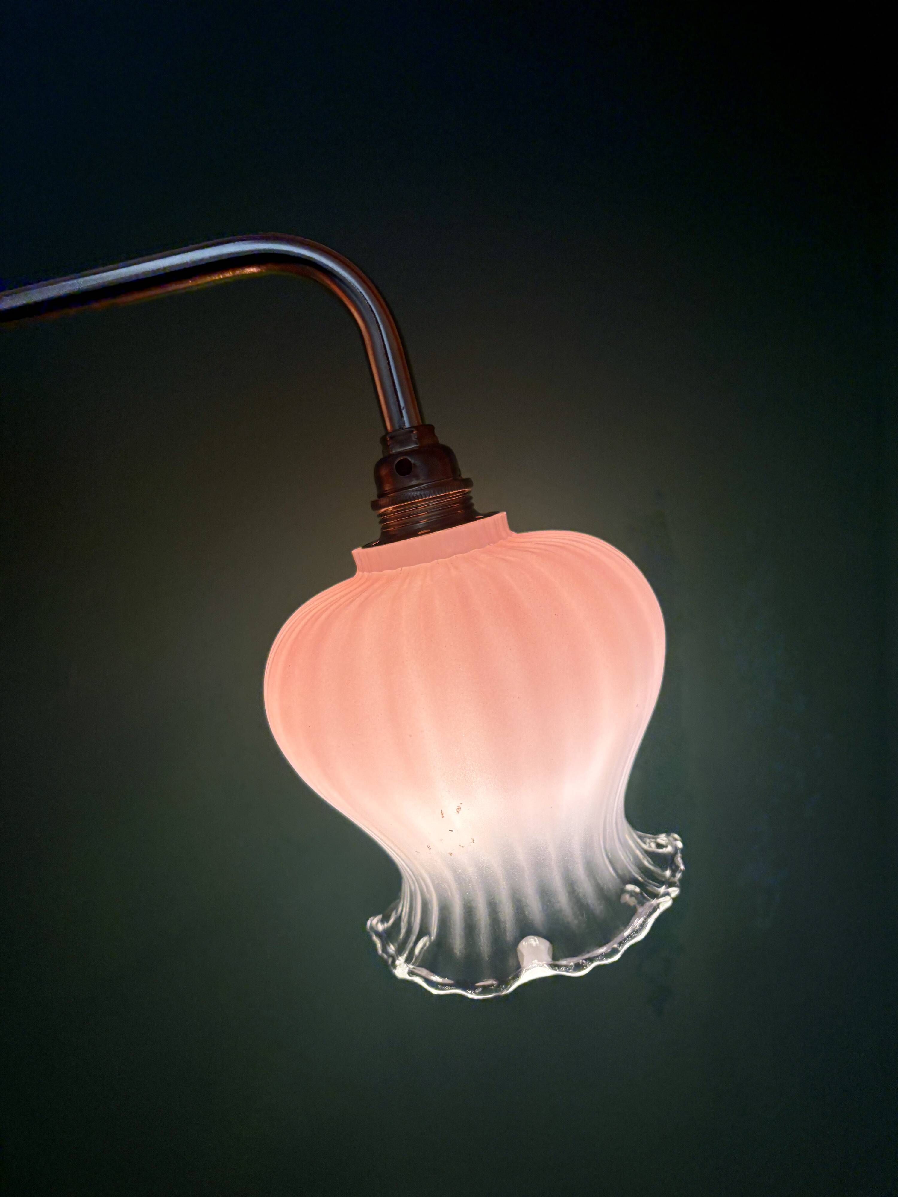 Vintage pink and clear glass elbow wall light.