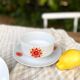 Hollow round plate duo and gravy boat in Winterling porcelain, 1970.