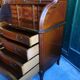 Secretaire commode a cylindre en bois verni