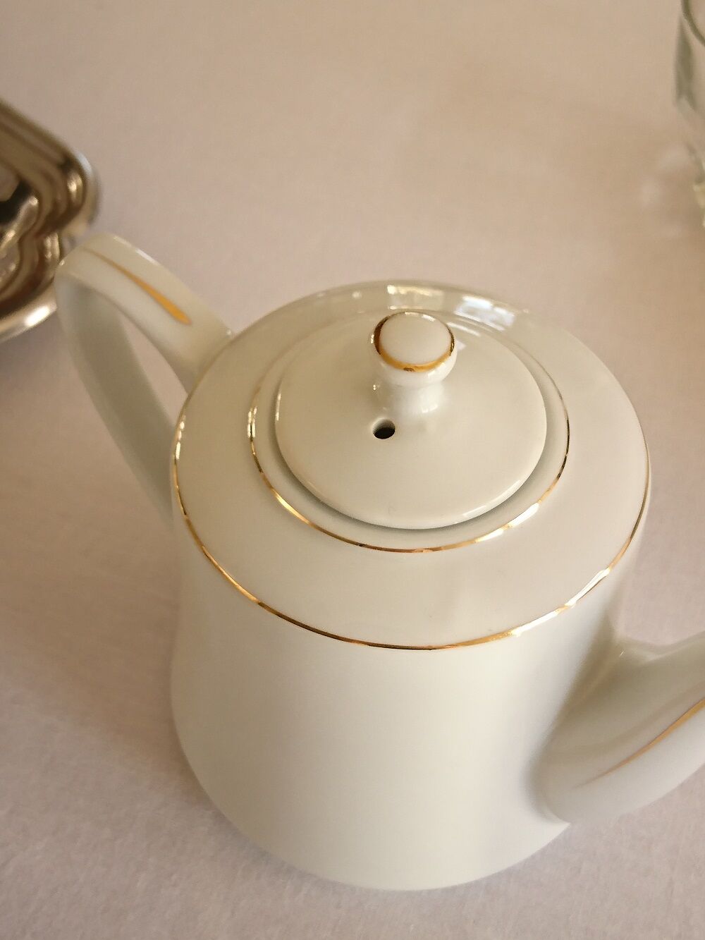 Selfish white porcelain teapot