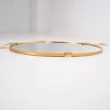 Hanging mirror in gilded brass