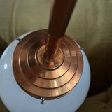 Opaline white globe pendant light with metal stem, Art Deco style.