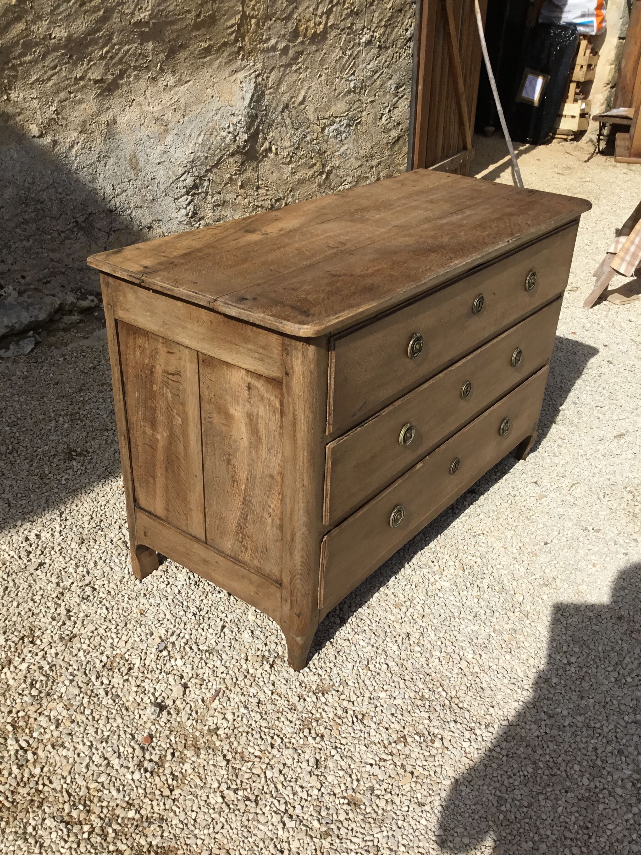 Louis XVI period chest of drawers opening on three drawers
