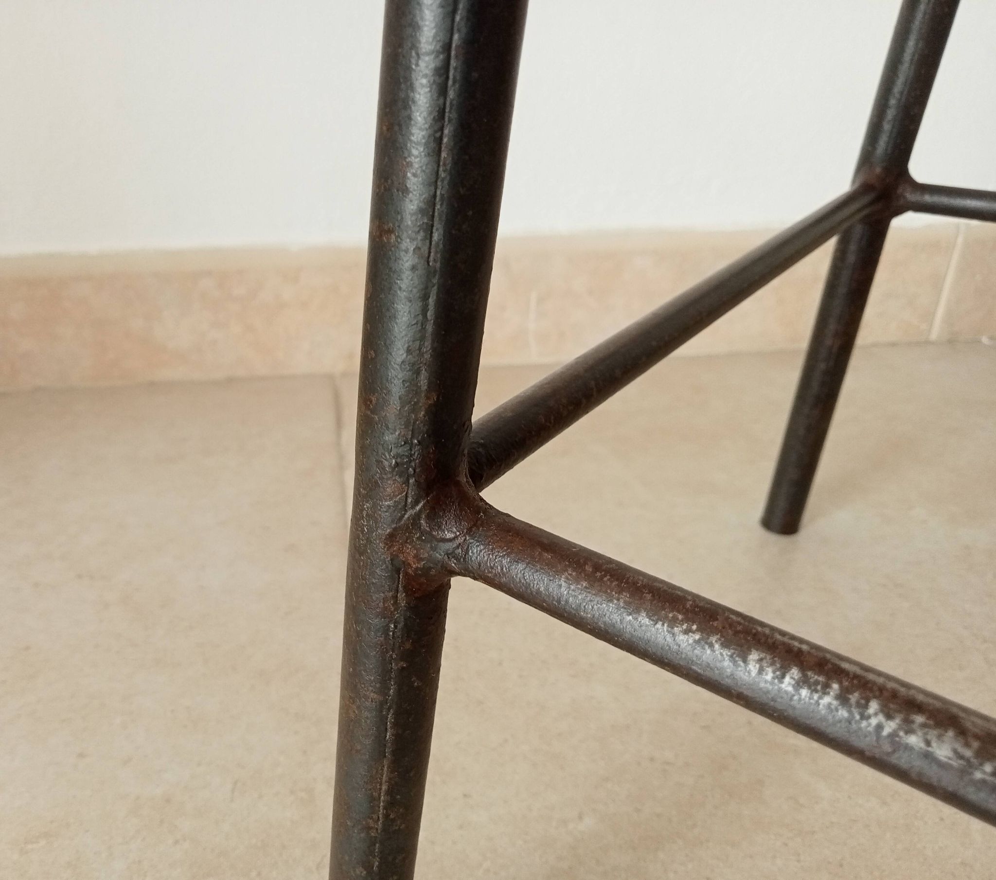 Brutalist high stool from the 1960s in solid steel.