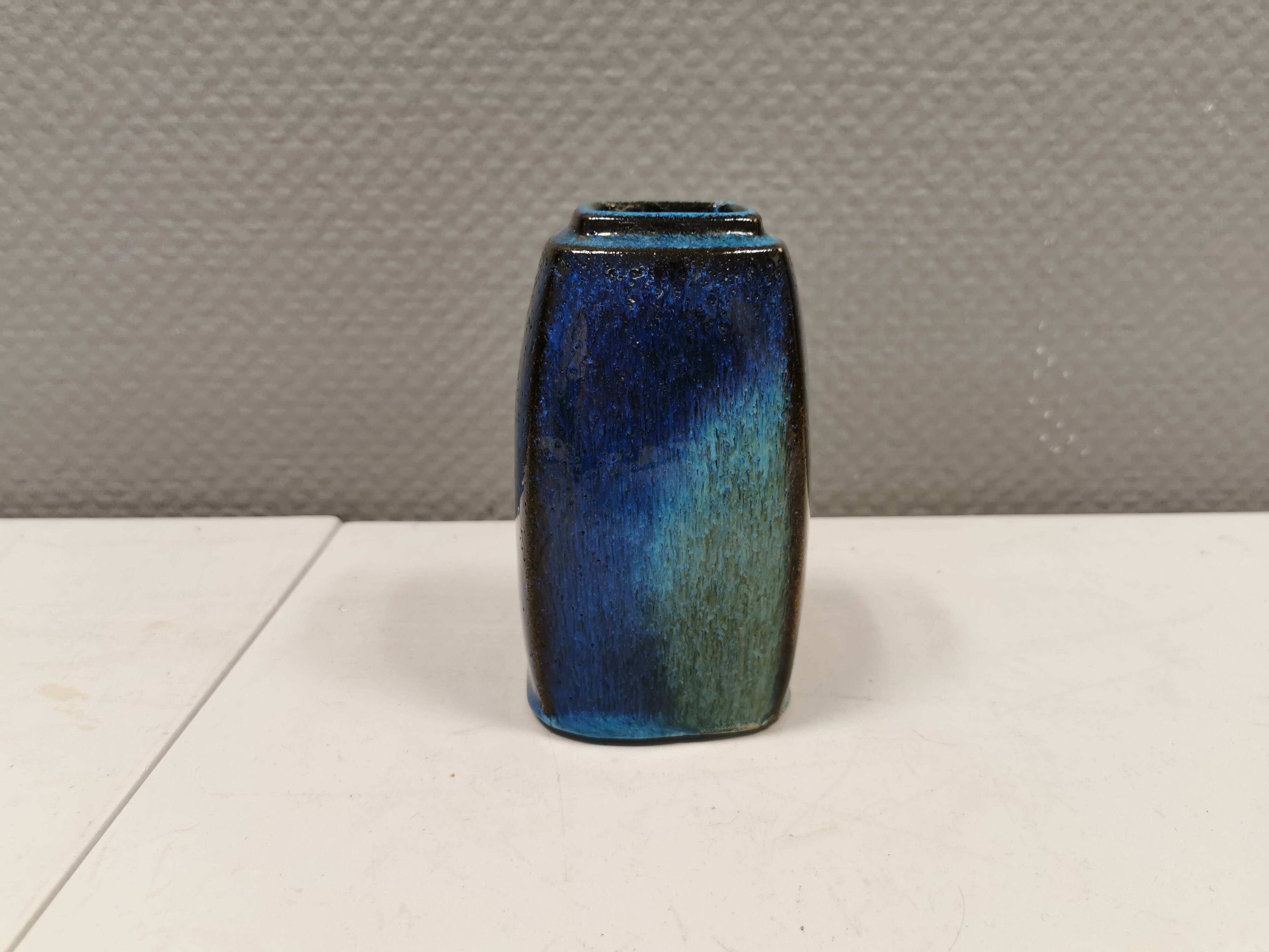 Vase in several shades of blue, from Danish Stogo art pottery. Estimated 1970-1980s