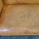 Unique old set of 2 club armchairs and a couch in cognac-colored leather with wheels