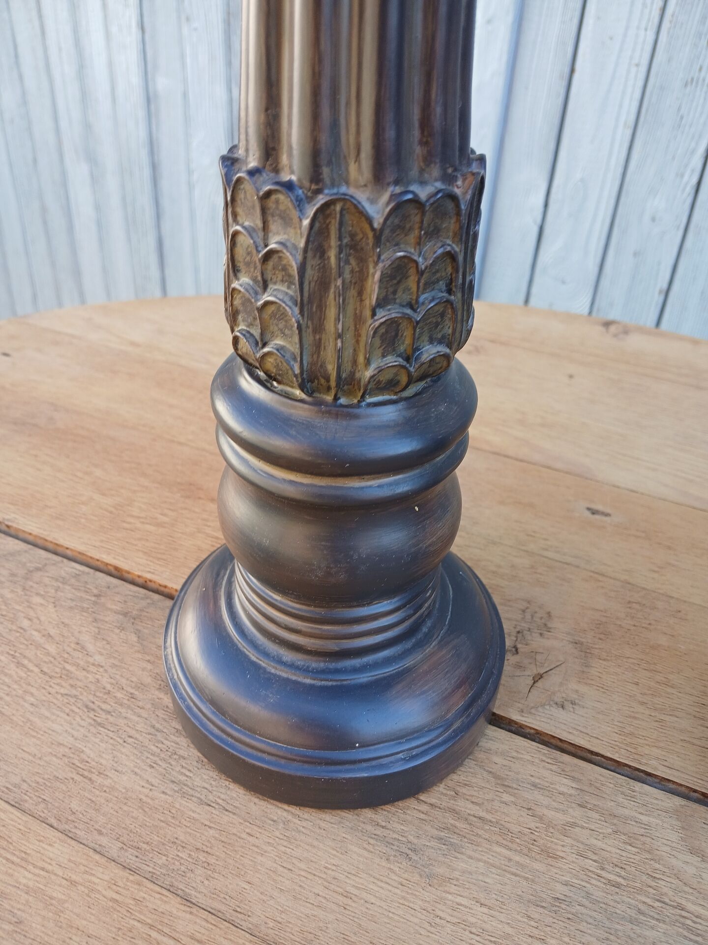 2 carved wooden candlesticks