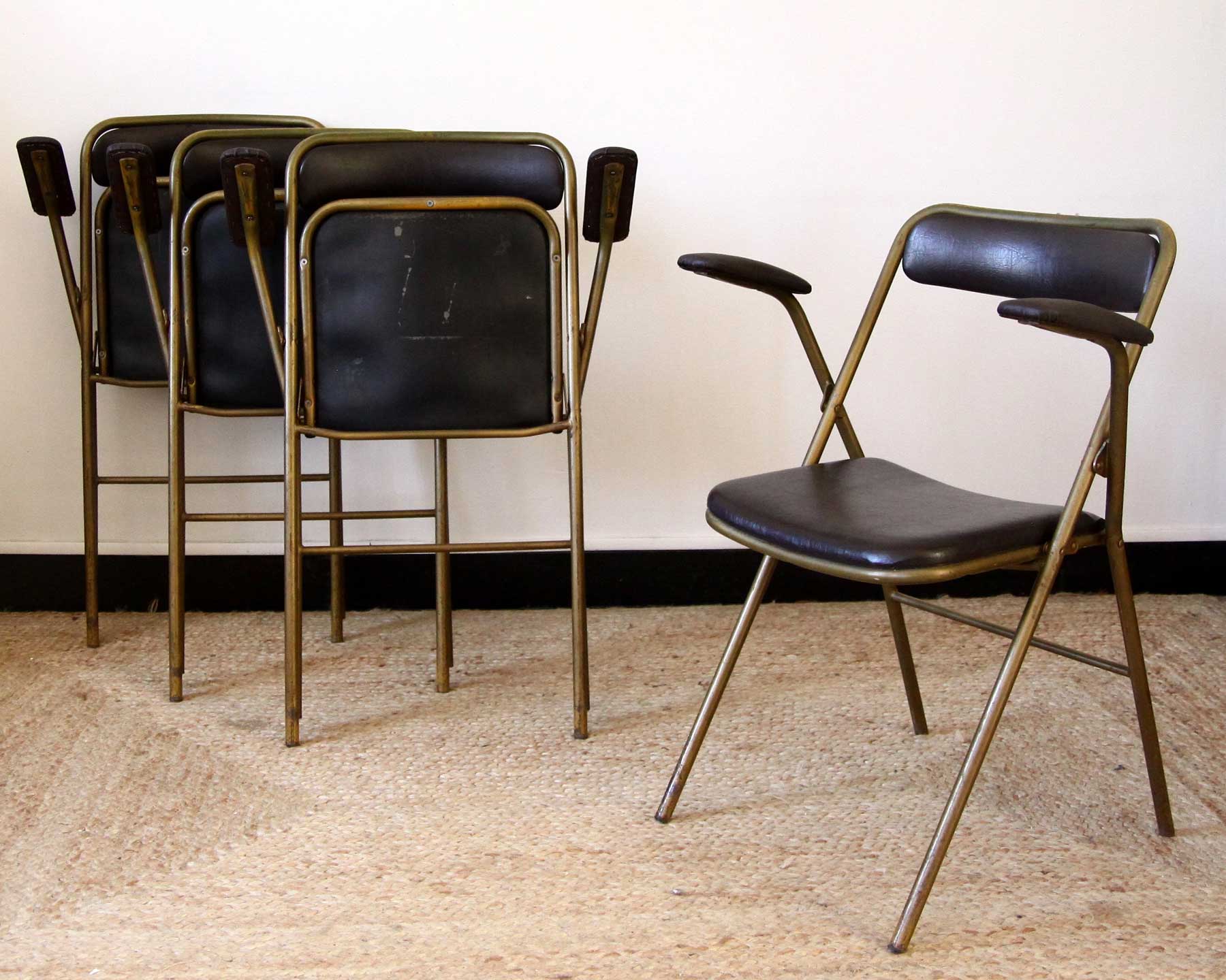 Lot of 4 metal and skai folding chairs