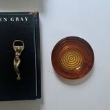 Amber pressed glass ashtray, 1970s design.