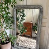 Antique mirror in stucco and wood