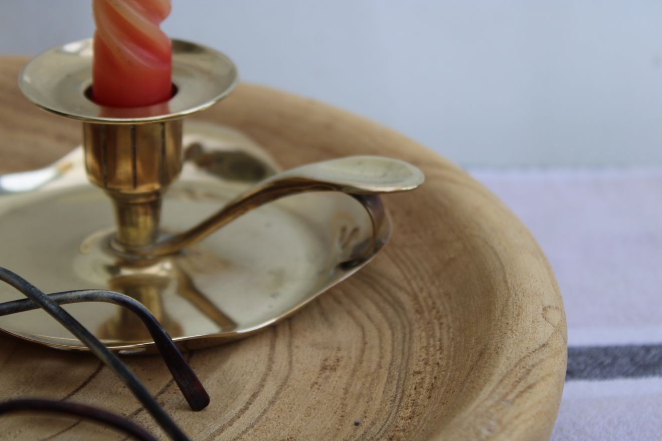 Golden brass candle holder